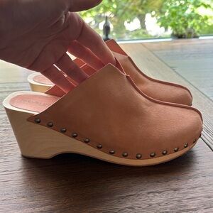 Kelsi Dagger studded clogs.